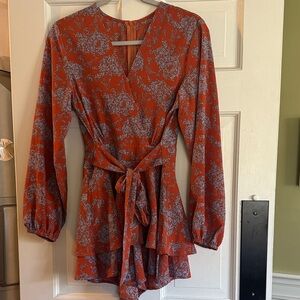 Never worn Orange and blue Floral Long Sleeve Wrap romper